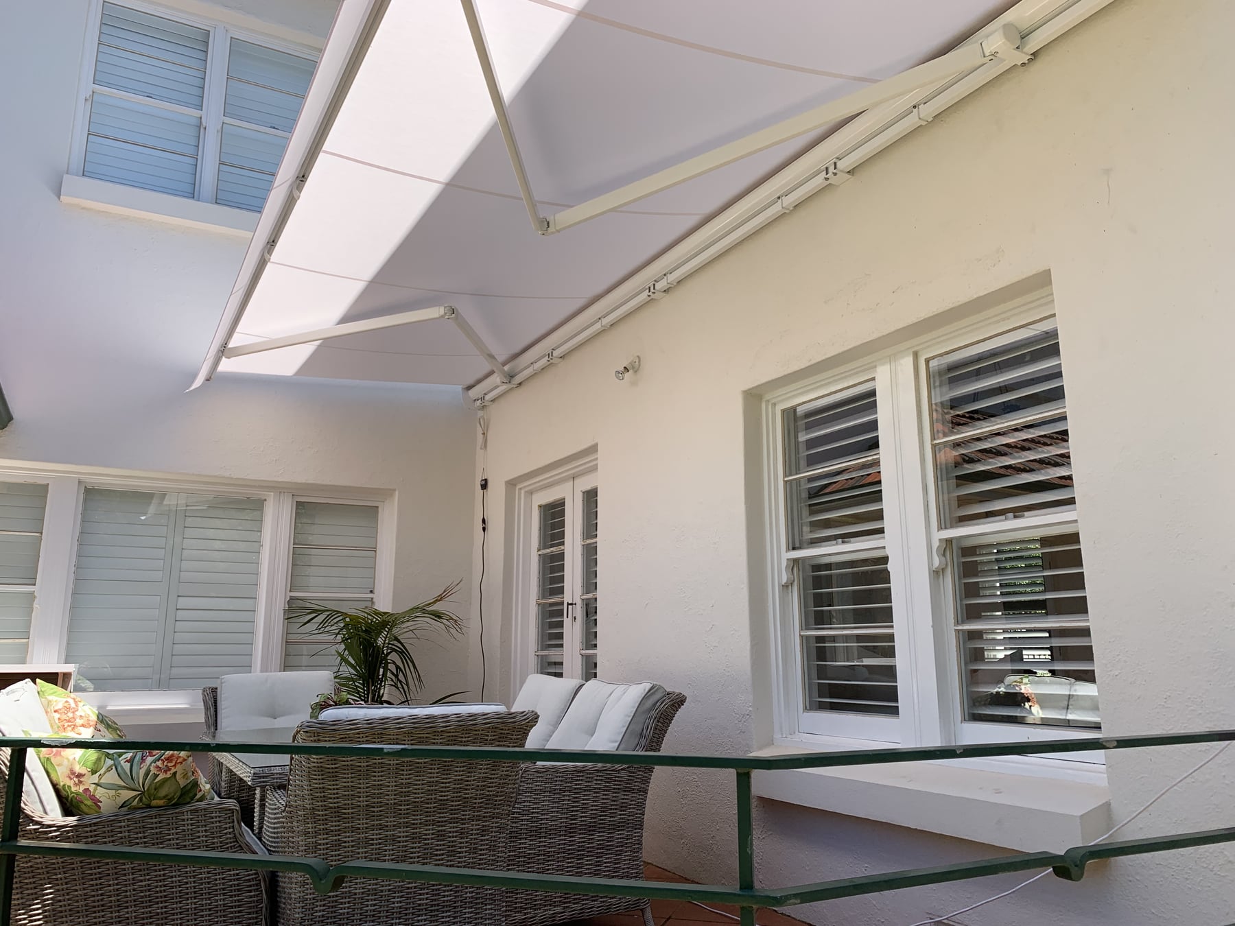 Folding arm awning