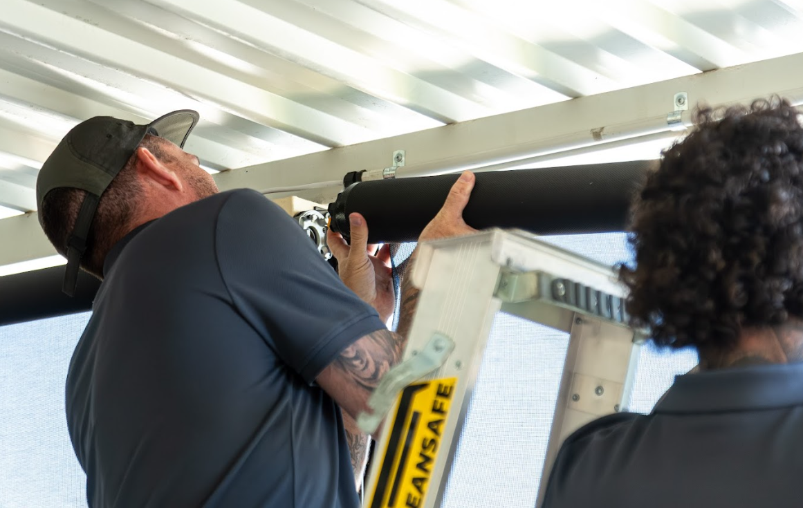 MIY team fitting an outdoor system