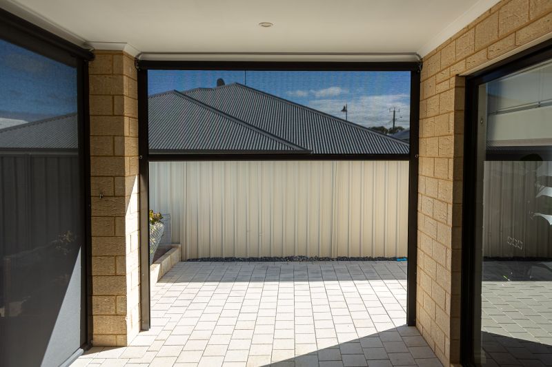 Channel blinds across two openings on a Lake Coogee home