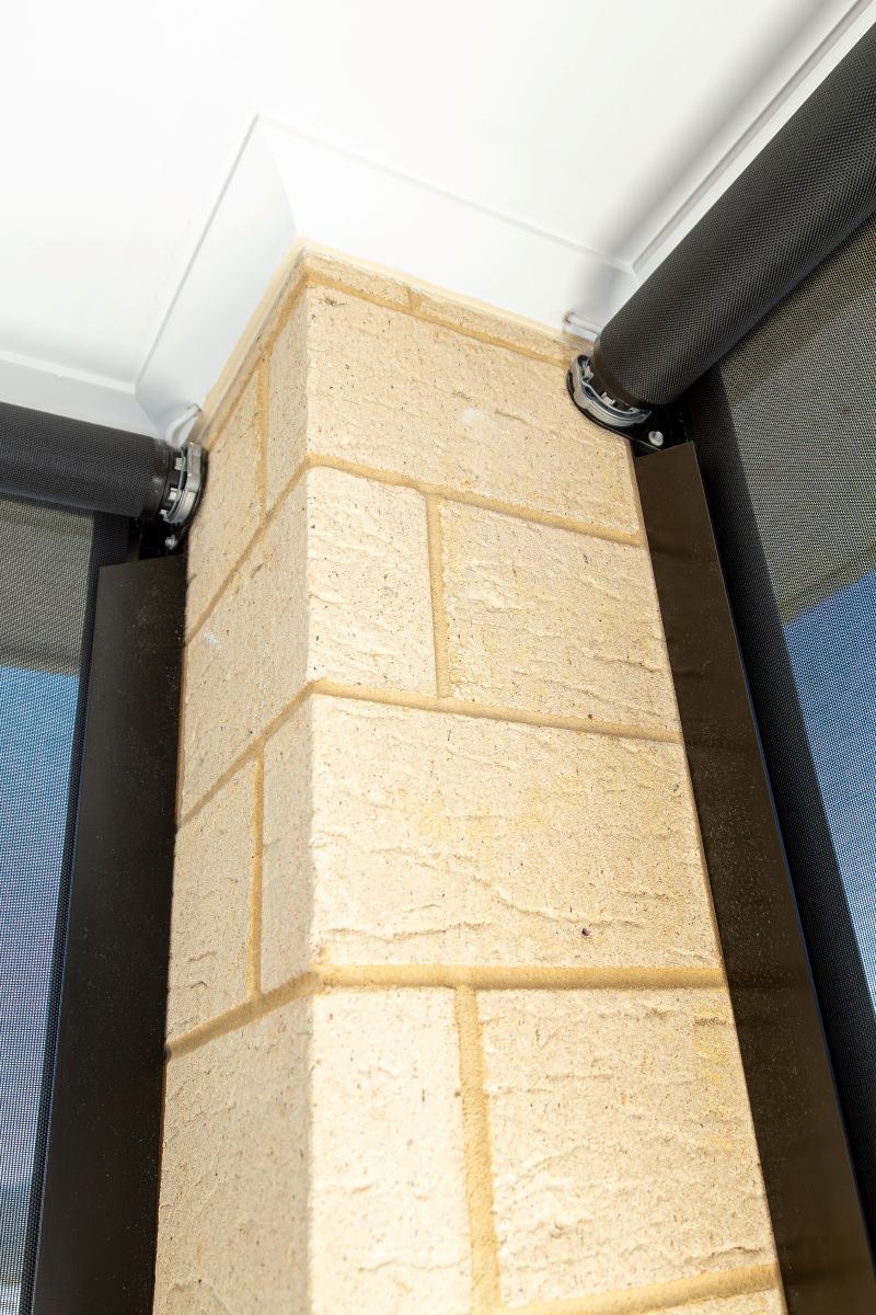 Channel blind side channels mounting around a brick column