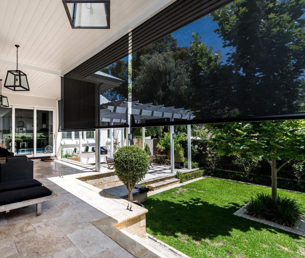 Heavy-duty channel blinds across a Perth patio